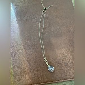 Set of 2 Swarovski Crystal necklaces. Set of 2. Color is gold and silver blue.